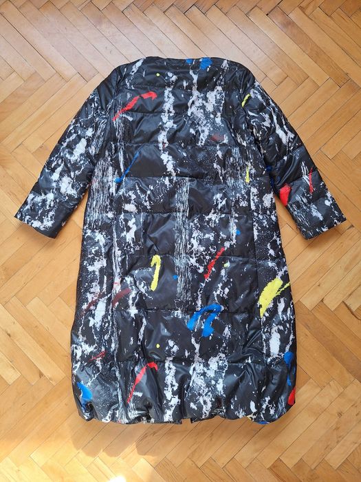 Тънко, леко, дълго пухено яке. Като ново.