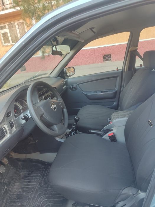 Нексия 2  Сонс гибрит матор лукс-кандисанер 2014 йил 320минг юргани  к