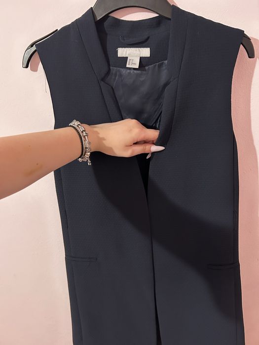 Vesta lunga eleganta