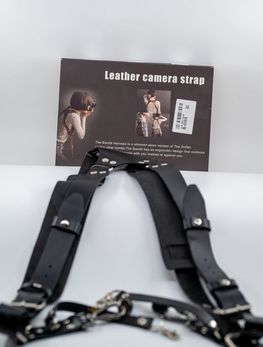 Кожен колан за два фотоапарата