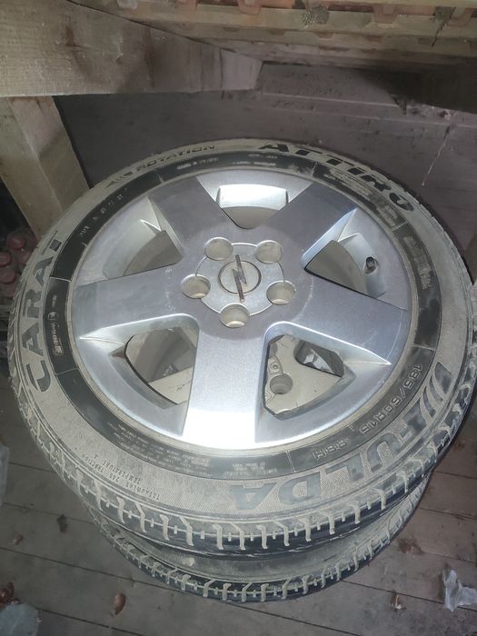Vând roti de Opel jenți și cauciucuri