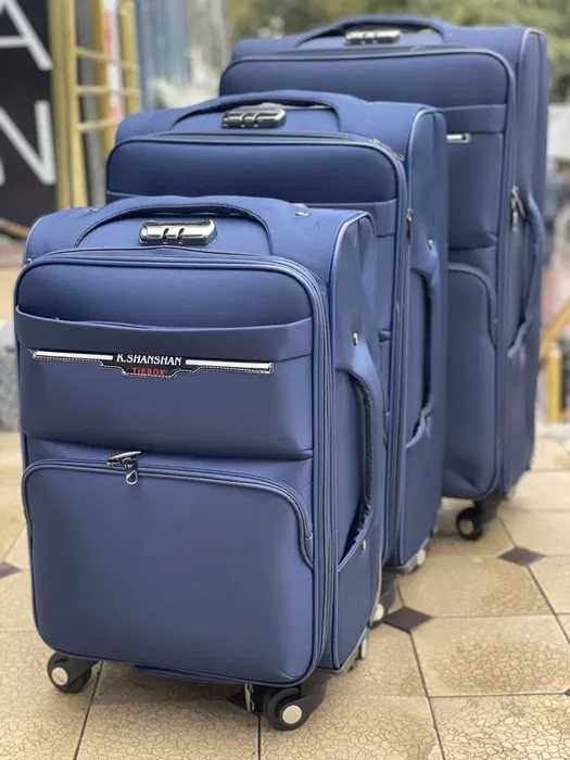Фирменные чемоданы 4 колесные