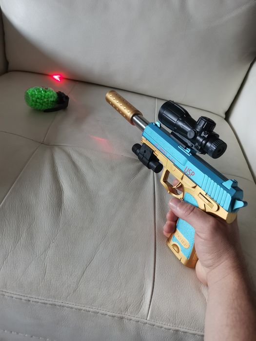 Pistol cu bile și laser + bile incluse 500buc plastic