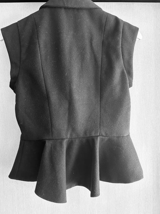 Елегантен изчистен елек