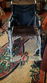 Инвалидную коляску продам