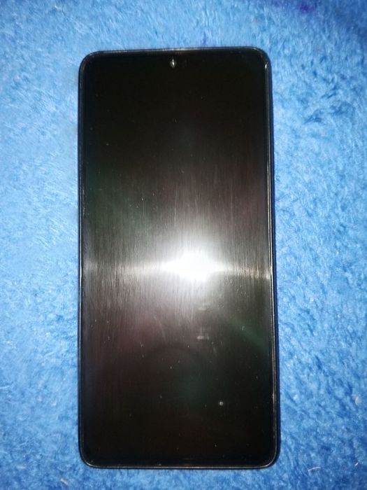 Redmi bote 14 qora 6/128 ideal zor aybi yoq