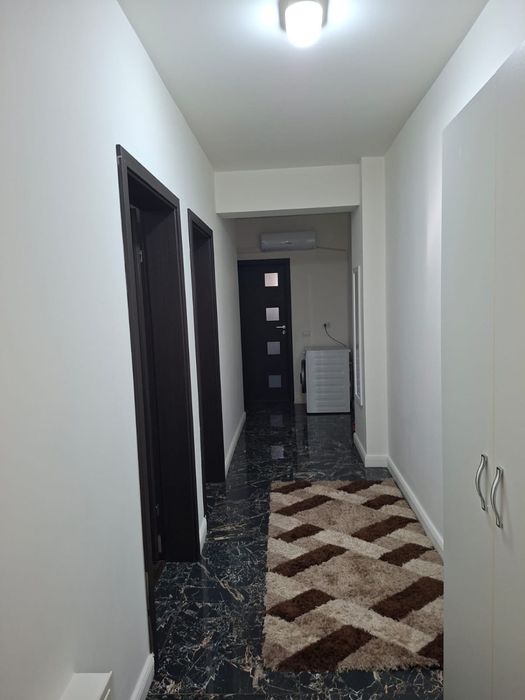 Vand apartament la parter,loc de parcare subteran langa botanica