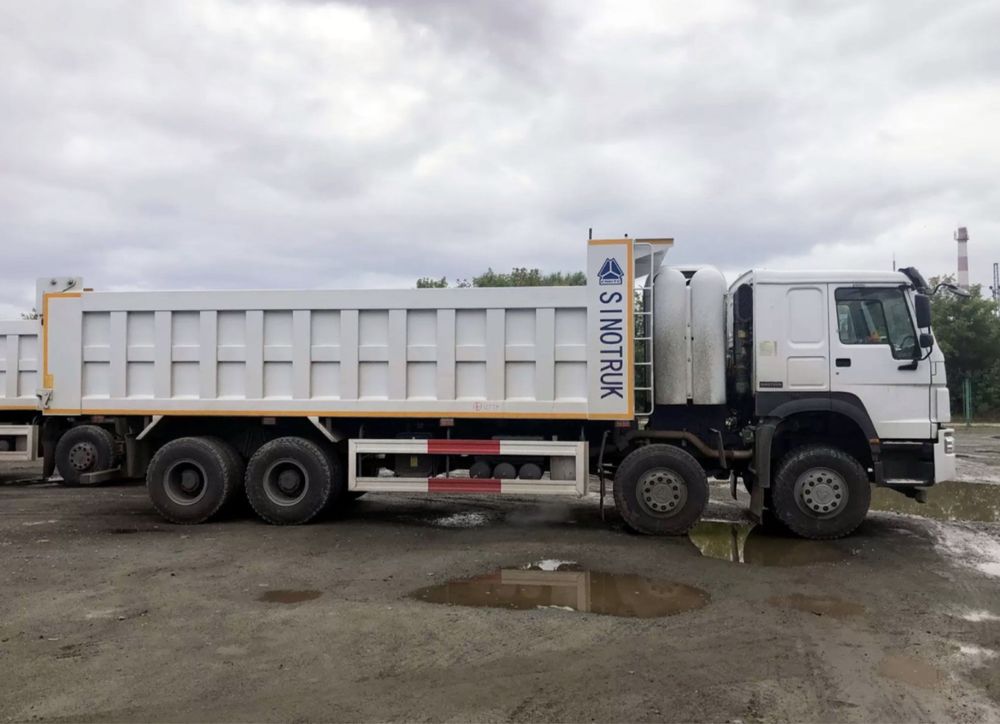Акция  до 30 июня Новый САМОСВАЛ HOWO HW76 8x4 CNG 26,2 куб.м 380 МКПП