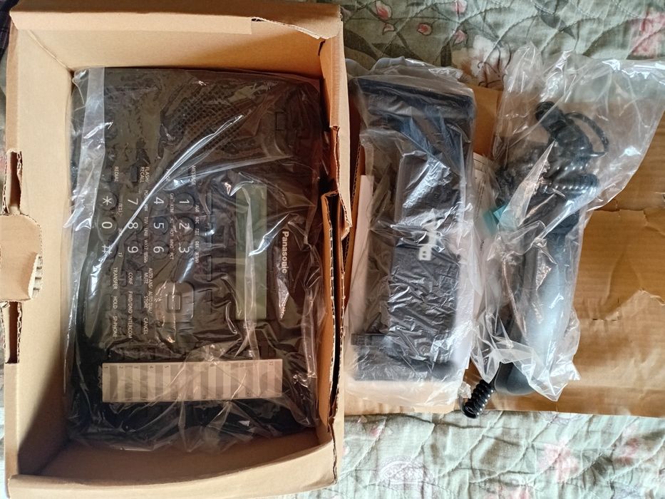 Системный телефон.