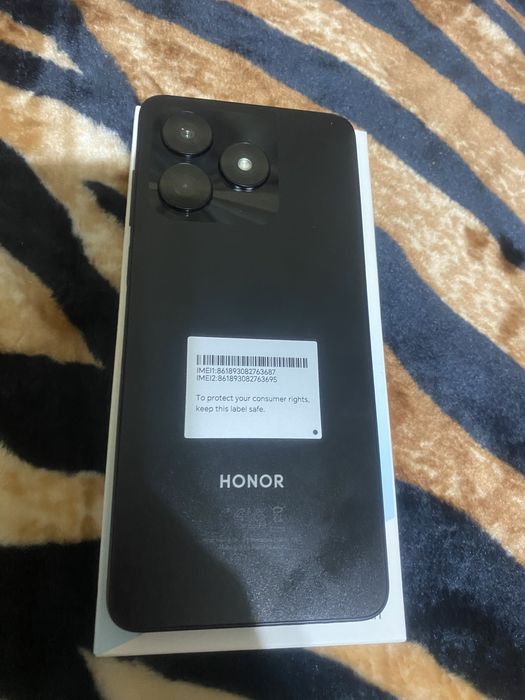 Honor x5c plus este nou