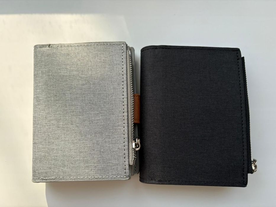 Продам бумажники Baellerry новый .