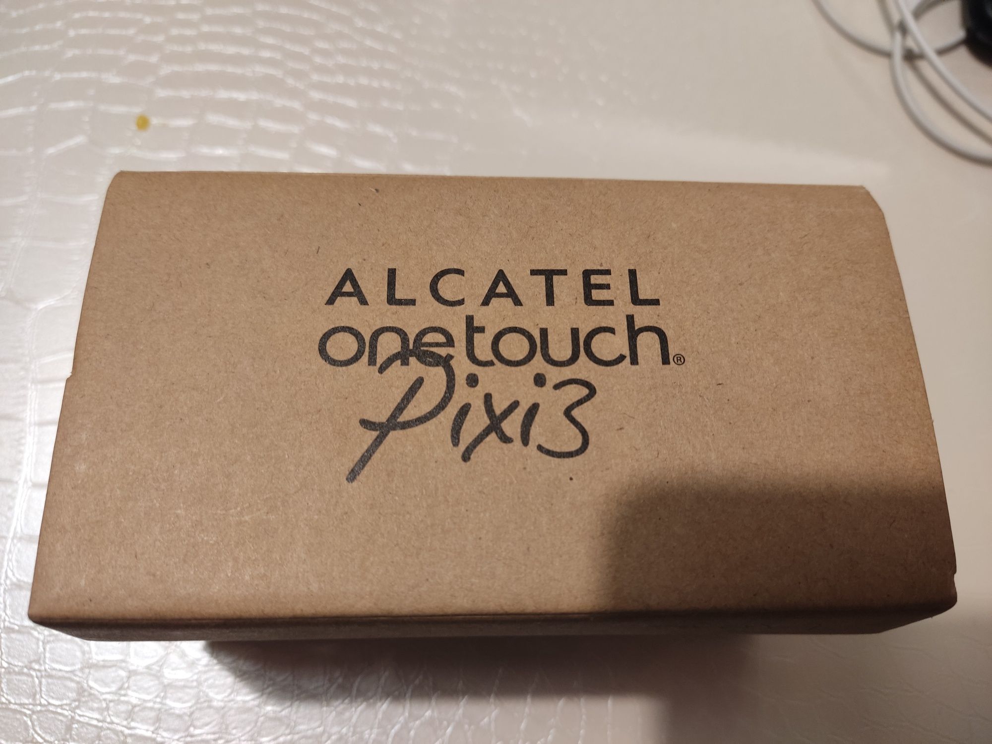 Телефон Alcatel one touch Pixi3