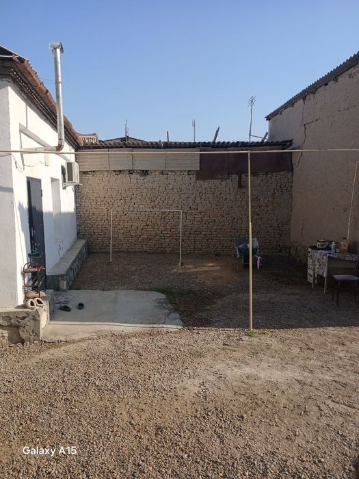 Продаётся часть участка Расположена в  центре  города Каган.