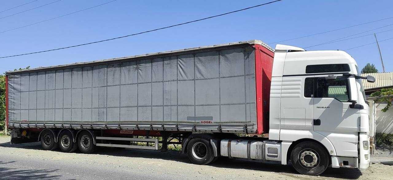 Тягач MAN TGX  2011 йил, автомат КПП, прицеп фрейхауф саф мост, 2009 й