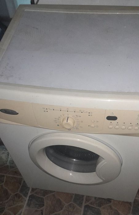 Пералня с горно зареждане и пералня за части