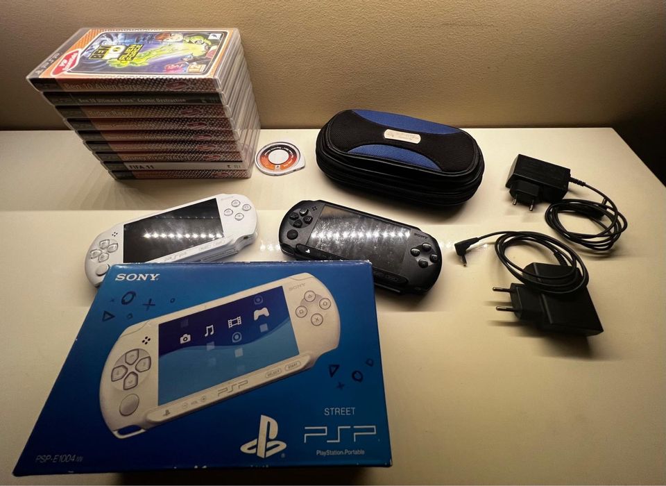 PSP Sony negru si alb cu jocuri