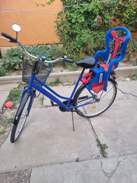Bicicleta feminină cu scaun de copii