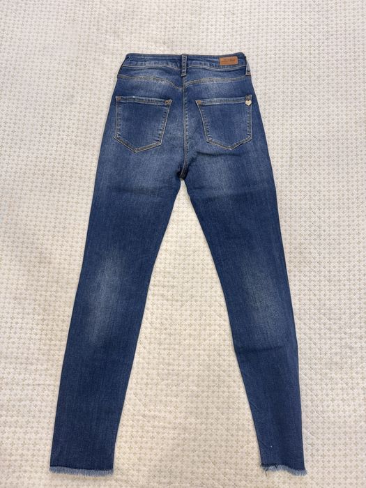 Продам джинсы Motivi