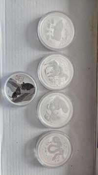 Сребърни монети, Кленов лист, Китайска панда, Кукабура,  Коала, Орел и