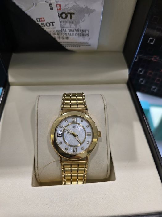 Продам классические часы Tissot в золоте 750 пробы