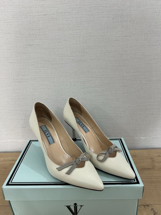 Белые туфли от Ilvi