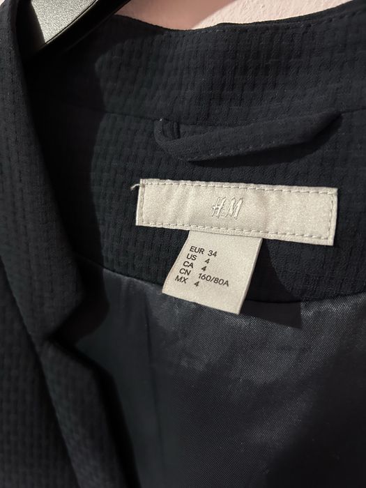 Vesta lunga eleganta