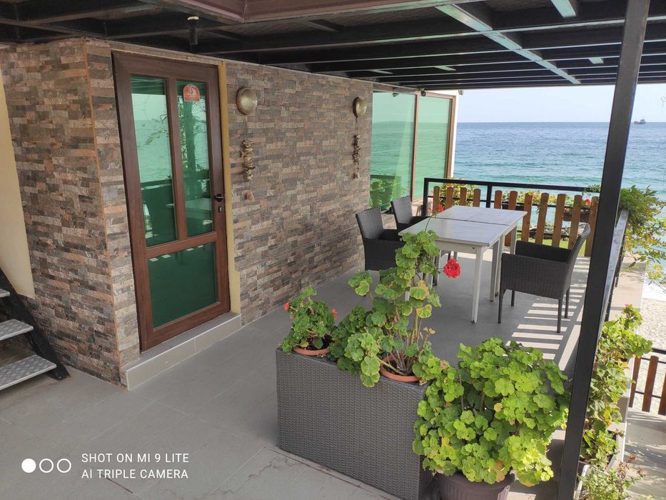 Нова Година или Коледа в къща с ресторант на плажа.