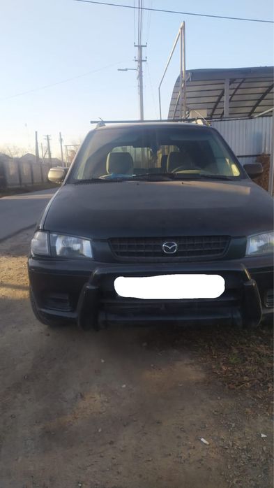 Продам машину Mazda Demio