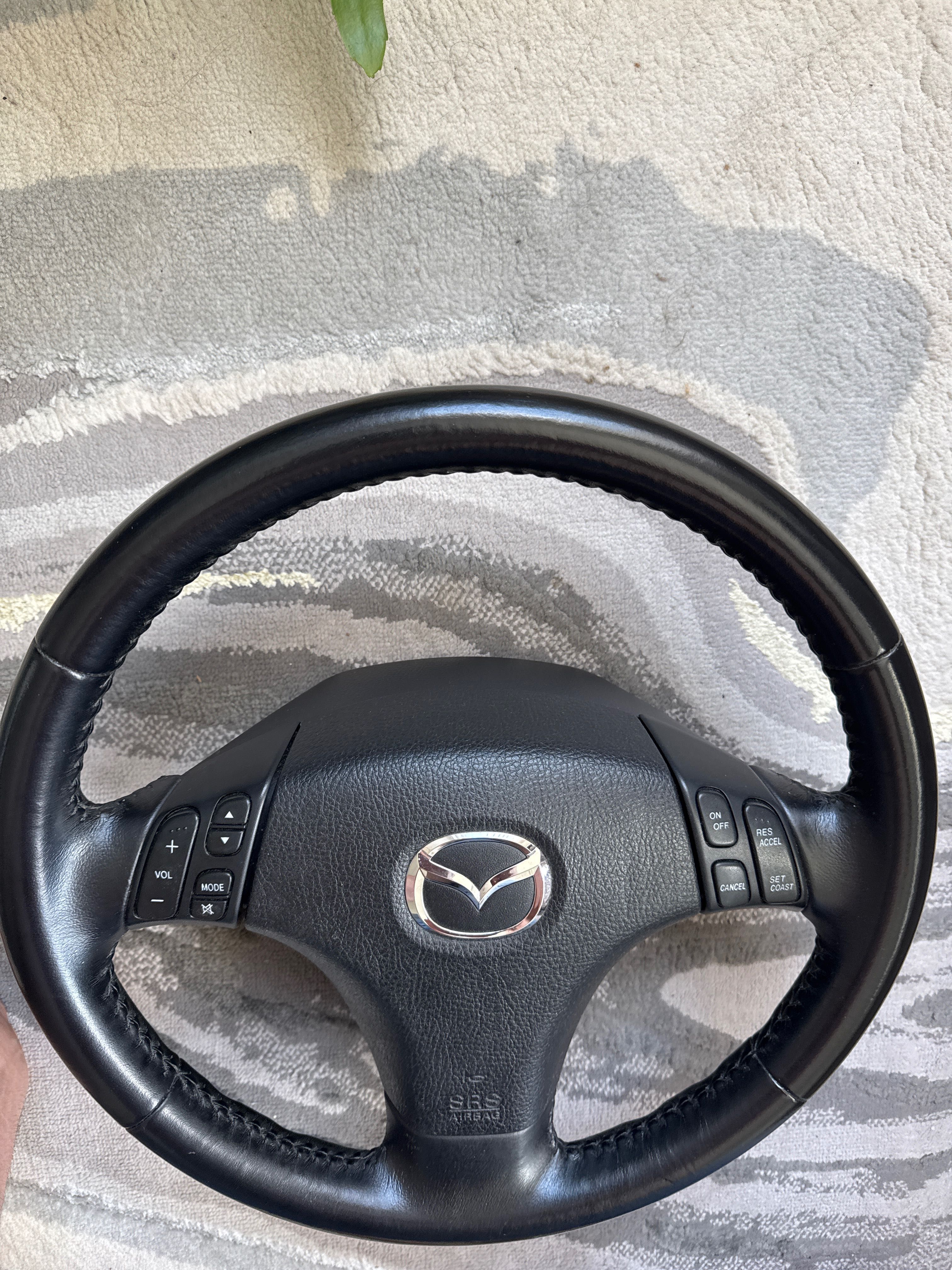 Mazda 6 кожен волан Мазда 6