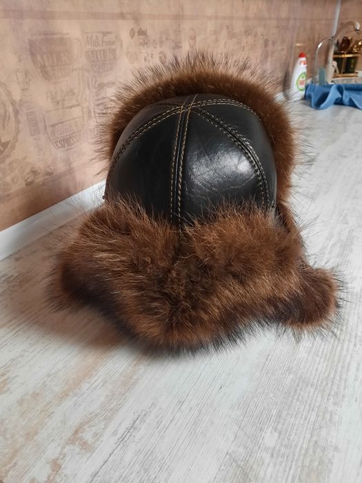 Продам мужскую шапку из енота
