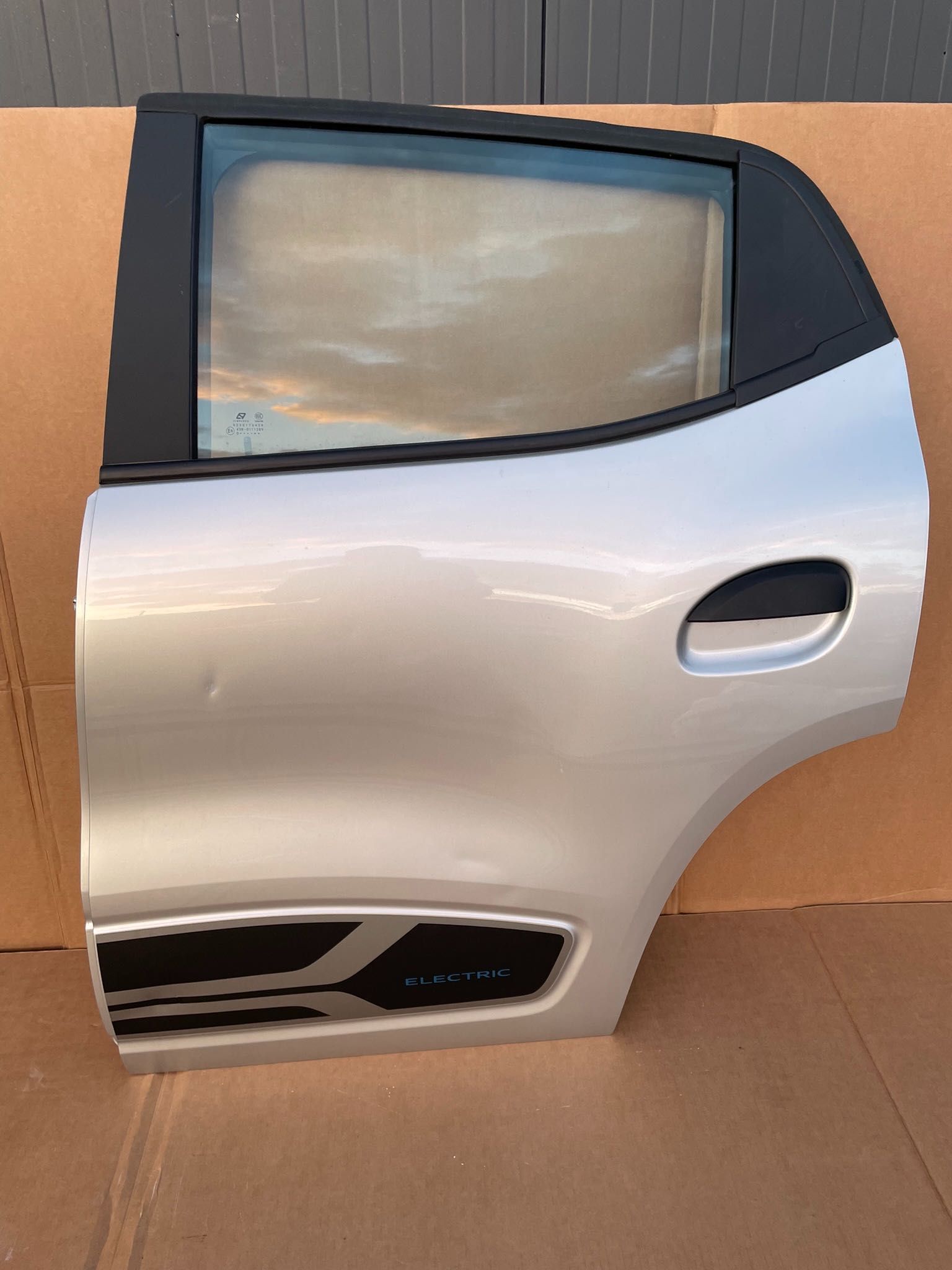 Usa spate completa dreapta stanga Dacia Spring vopsea originala