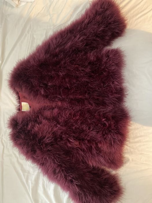 Сако от паунови пера