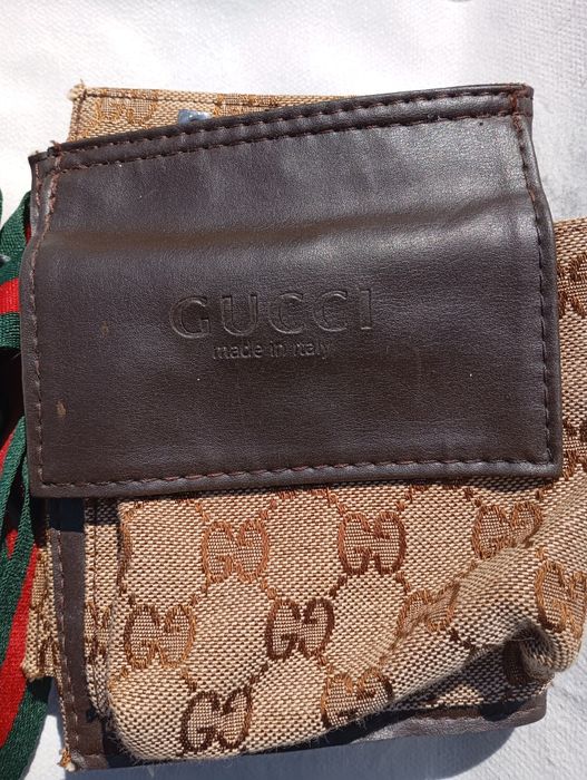 Vând borseta unisex marca GUCCI,Made in Italy,produs nou