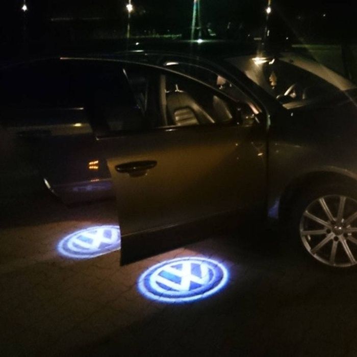 Proiectoare logo portiera cu orice marca ! VW BMW Audi Opel Dacia