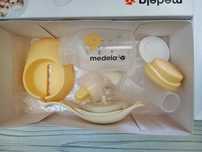 Молокоотсос WELEDA Швейцария двухфазный,механический