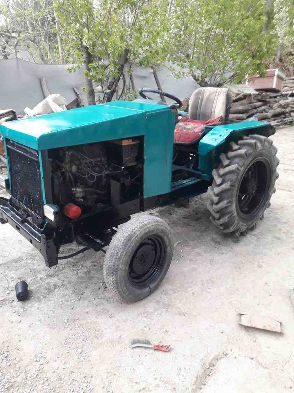 Мини трактор с гидроусилителем