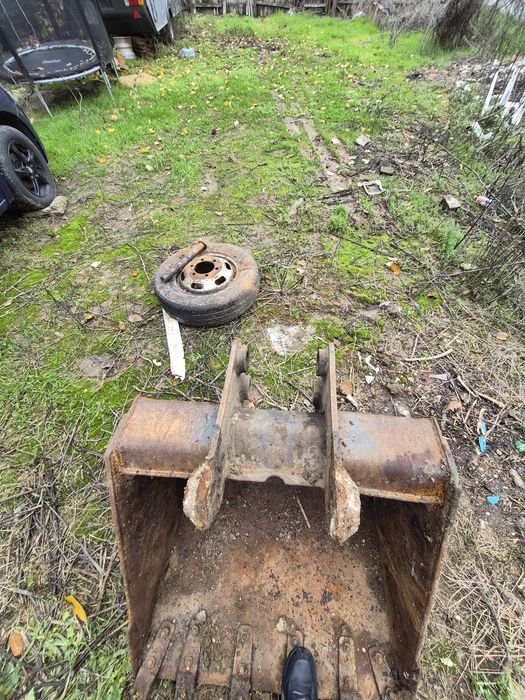 Cupe buldoexcavator caterpilar