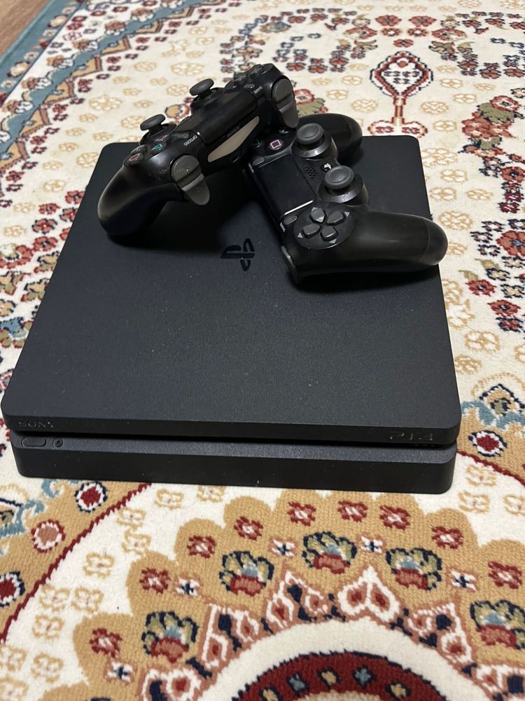 Продам PlayStation 4, с играми и рулем
