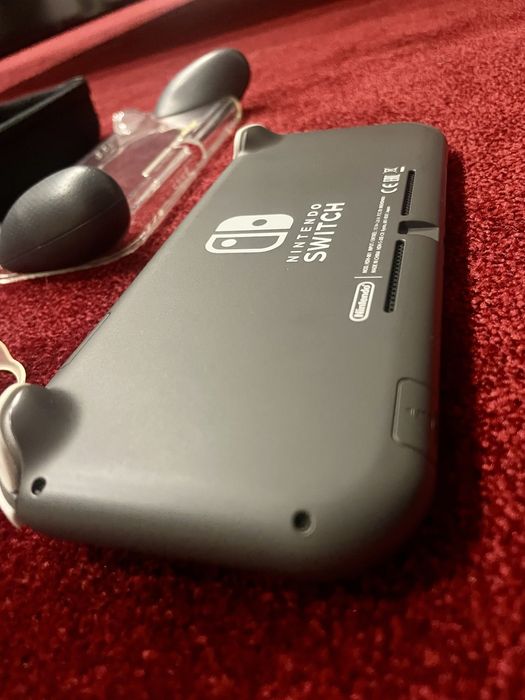 Nintendo Switch lite + accesorii impecabil