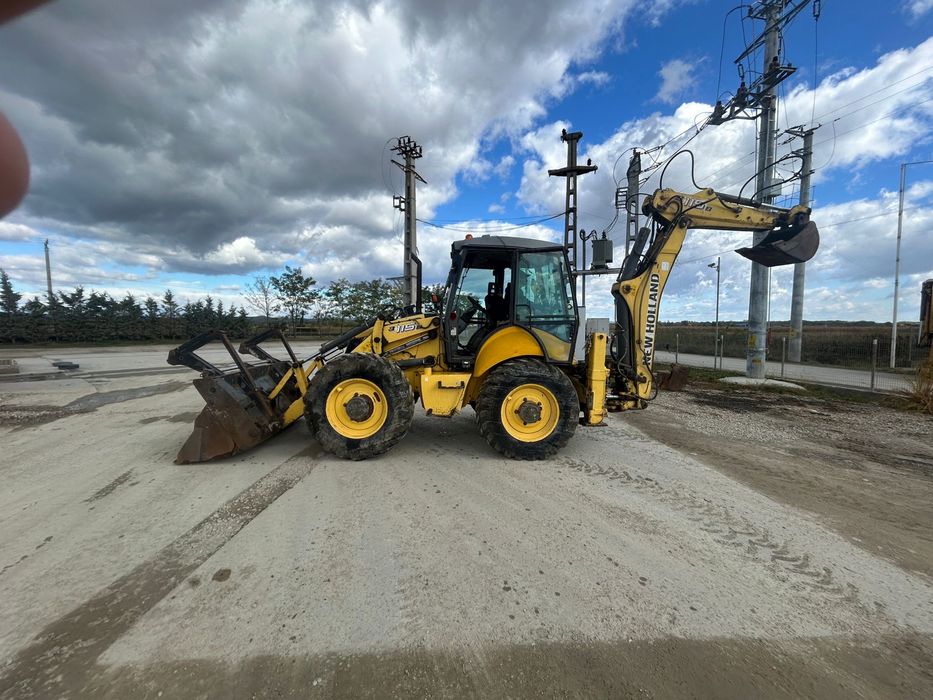 Buldoexcavator new holland B 115 B