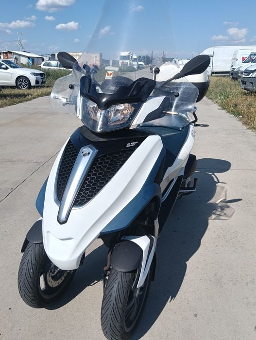 Scuter 3 roti piaggio mp 3 categoria b  2013