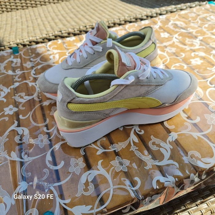 Adidas dama Puma