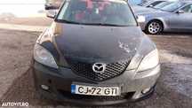 Dezmembrez Mazda 3 2004