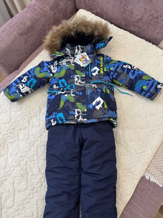 Продам новый детский комбинезон