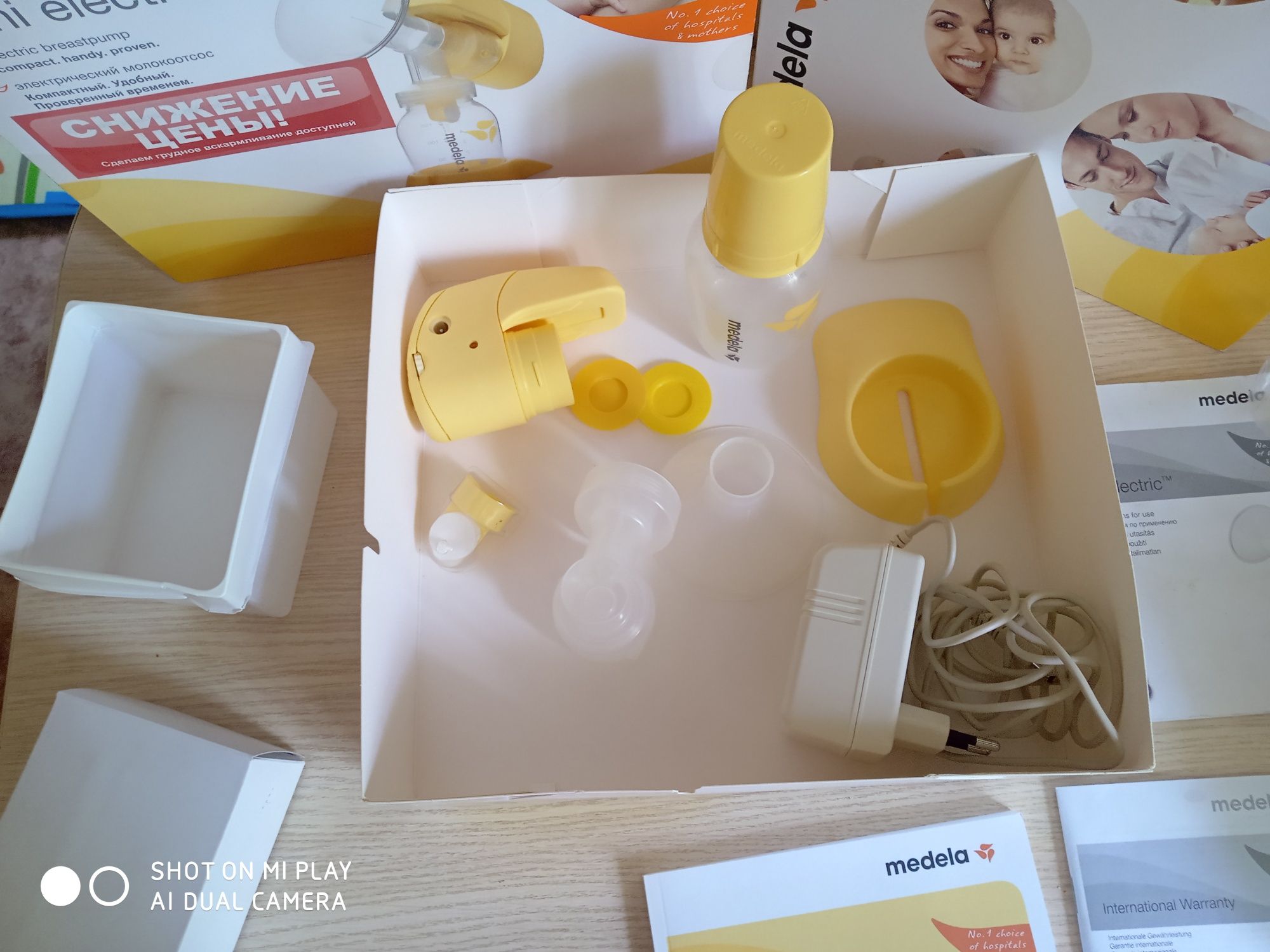 Молокоотсос MEDELA MINI Electric+ подарок