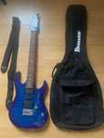Chitară electrică Ibanez GRX70QA-TBB GIO semnată de Ronnie Romero