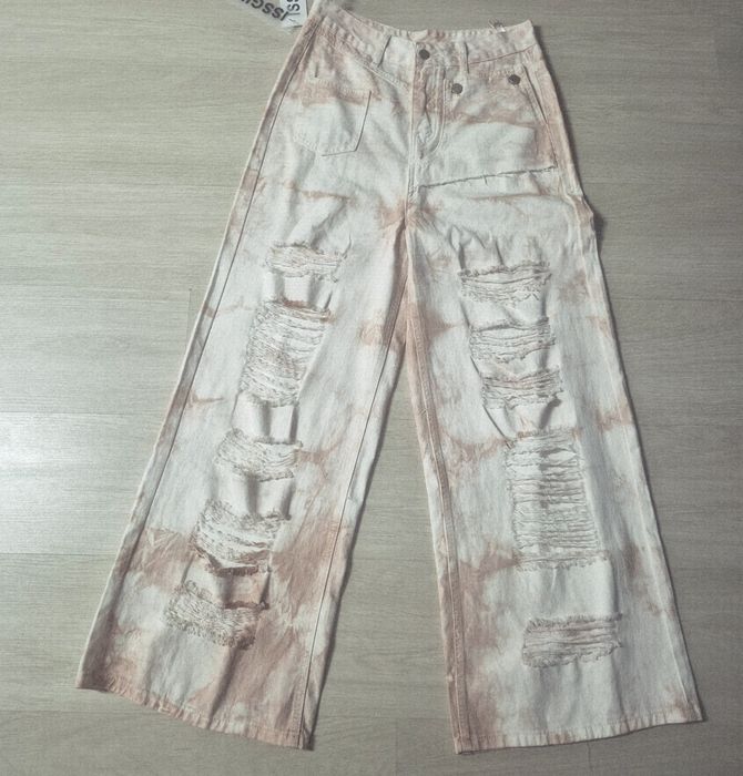 Blugi dama in degrade cu taieturi .