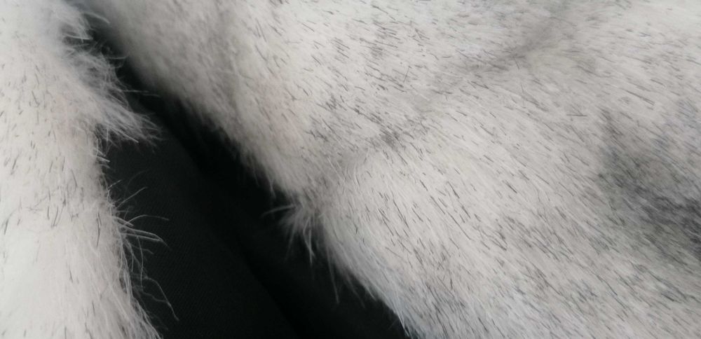 Дамско пухкаво елече