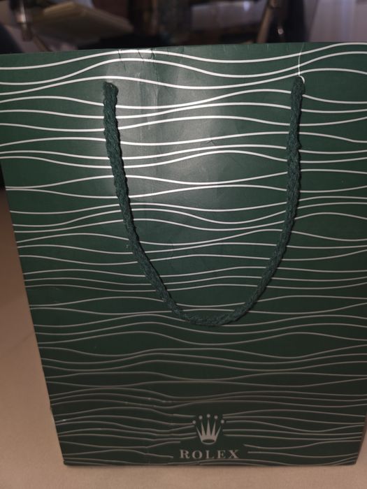 Часовник Rolex Submarimer