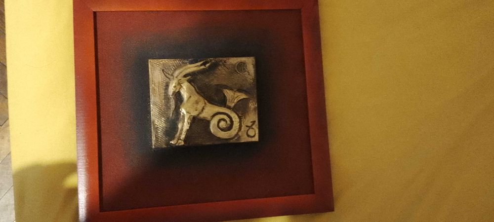 Картина със зодиакален знак козирог